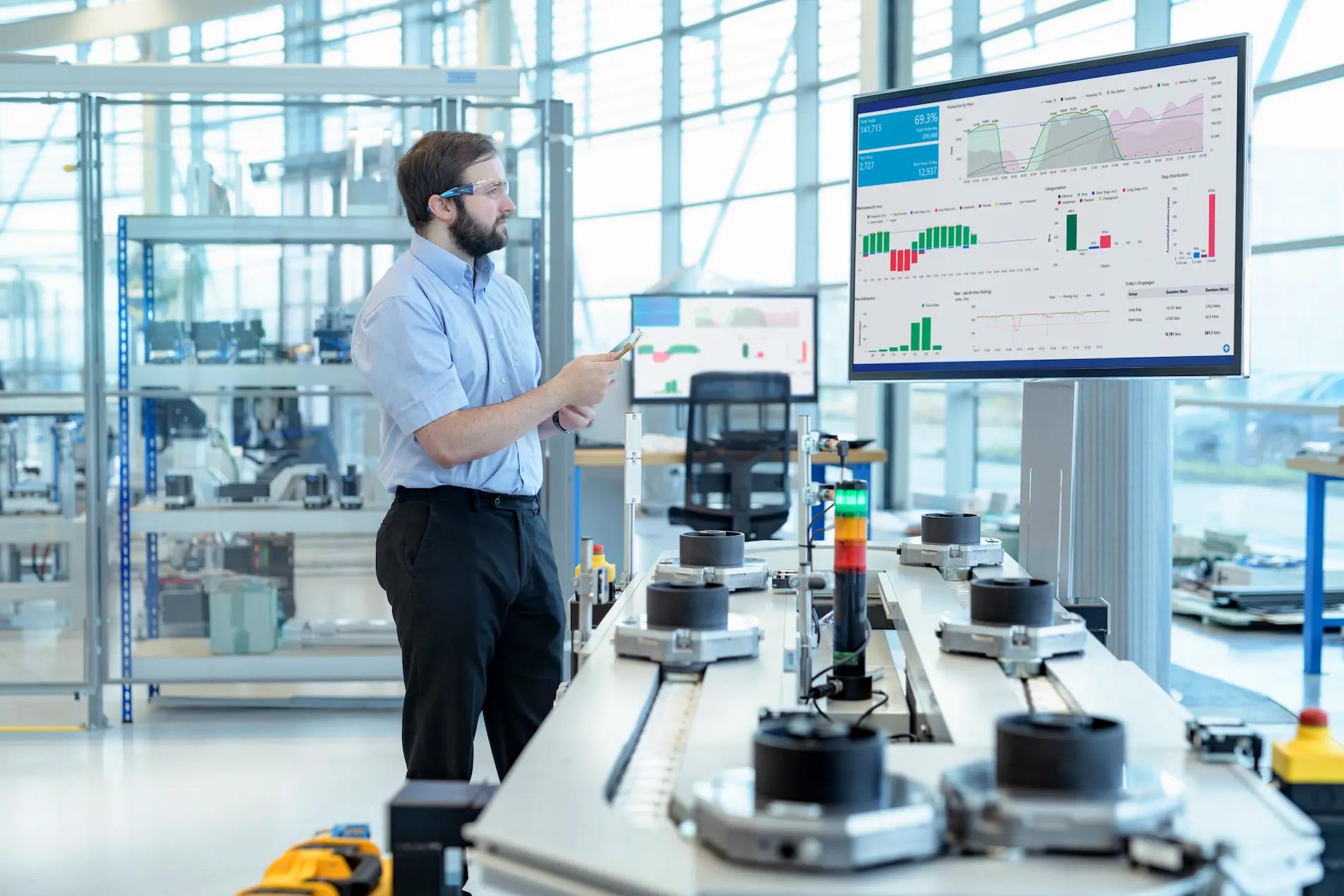 engineer-testing-a-robotic-production-simulator