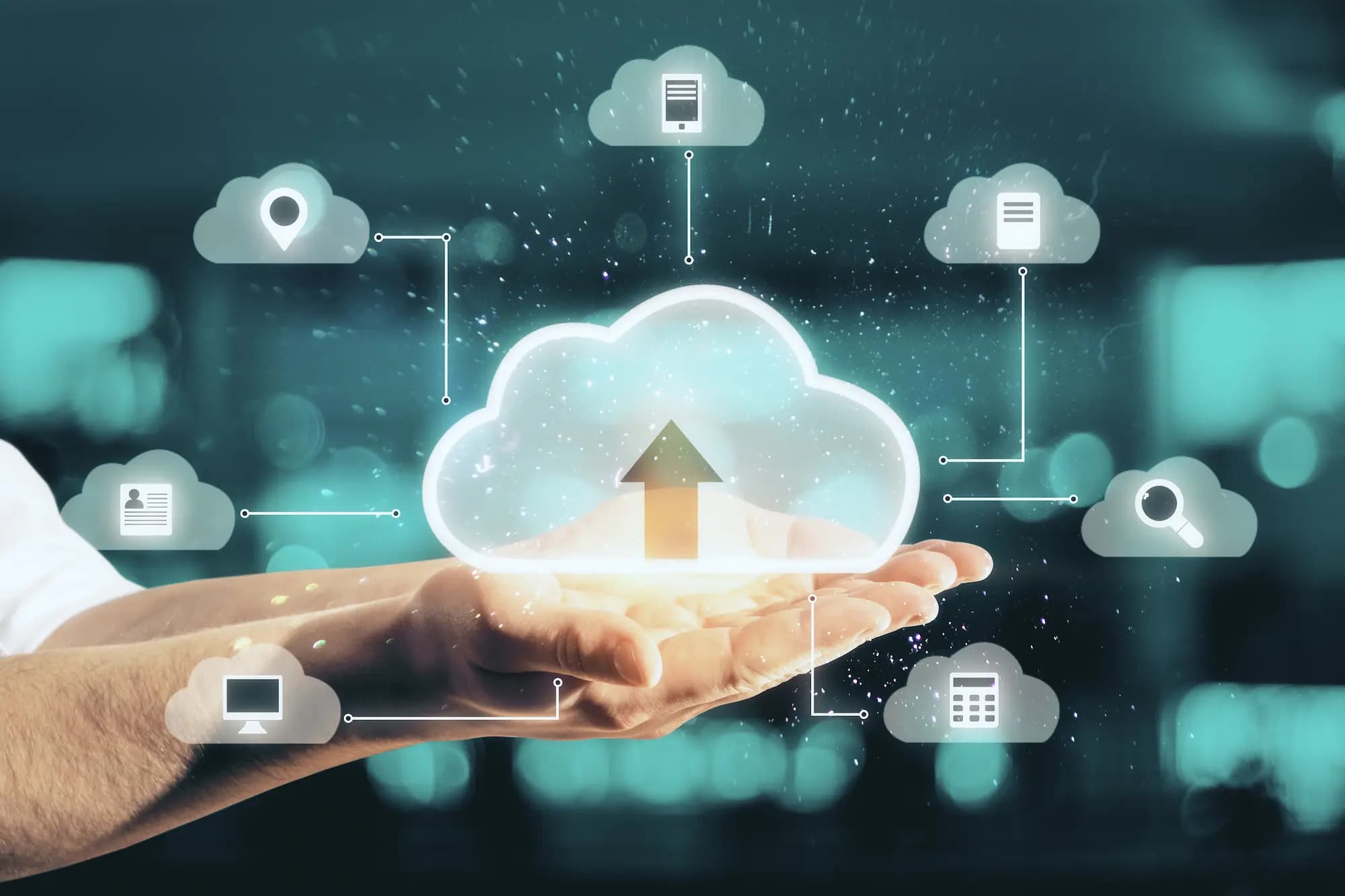 Cloud computing architecture in hand, illustrating legacy system modernization and cloud-native platform development.