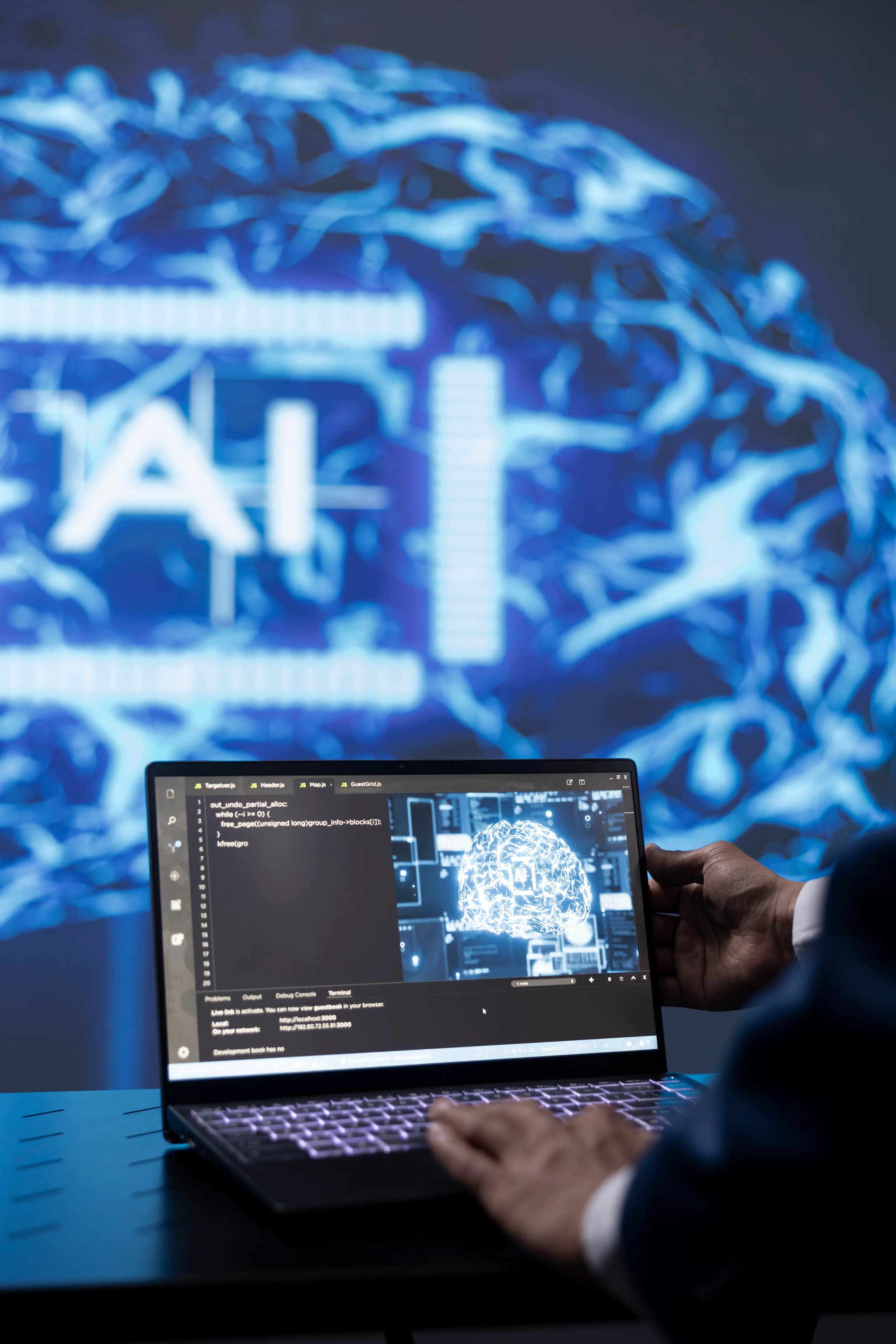 AI technology professional working on laptop, developing cloud-native applications, modernizing legacy systems, and building scalable microservices with AI-driven code analysis.