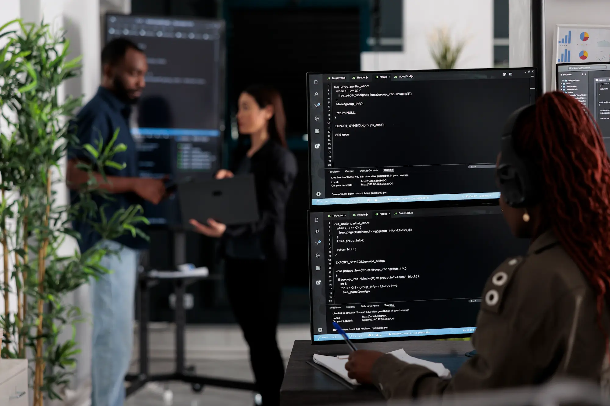 Software engineers developing custom enterprise business applications using AI-powered engineering 